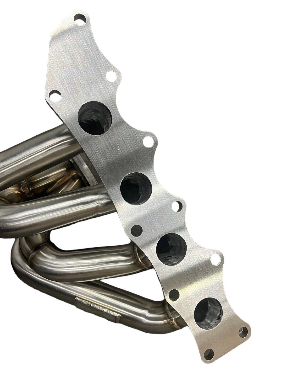 JackSpania Racing tubular turbo manifold for MazdaSpeed 3 with 2.3L Disi MZR engine, fits OEM size turbos, exhaust parts.