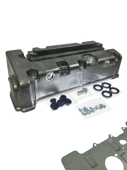 Cast aluminum K Series vented valve cover baffle for Honda Acura K20 K24 engines by Jack Spania Racing, featuring AN10 fittings.