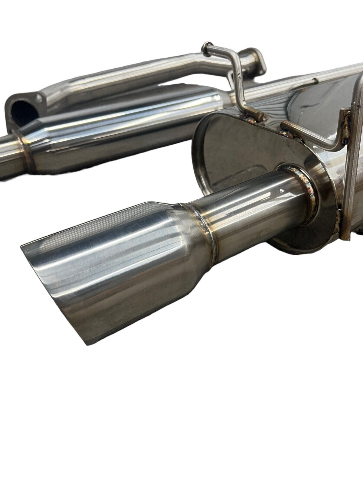 Stainless steel 2.5-inch exhaust system muffler for 2007-2011 Honda CR-V, installed on a CR-V vehicle.