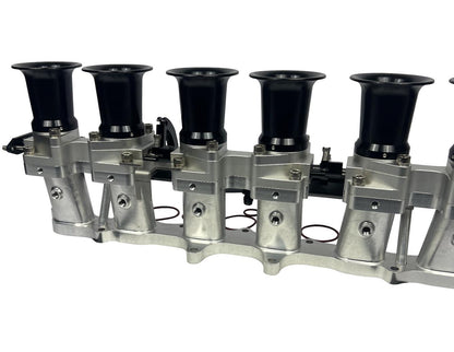 JackSpania Racing intake manifold with individual throttle bodies and fuel rail for 2JZGE engine, engine parts for performance tuning.