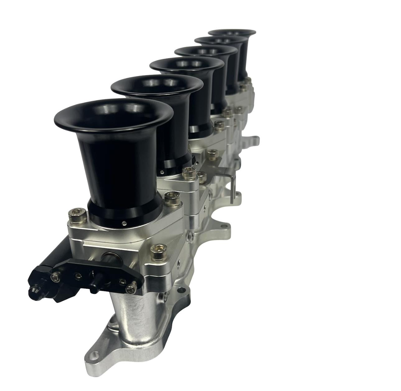JackSpania Racing intake manifold with individual throttle bodies and fuel rail for 2JZGE engine, showing polished metal components.