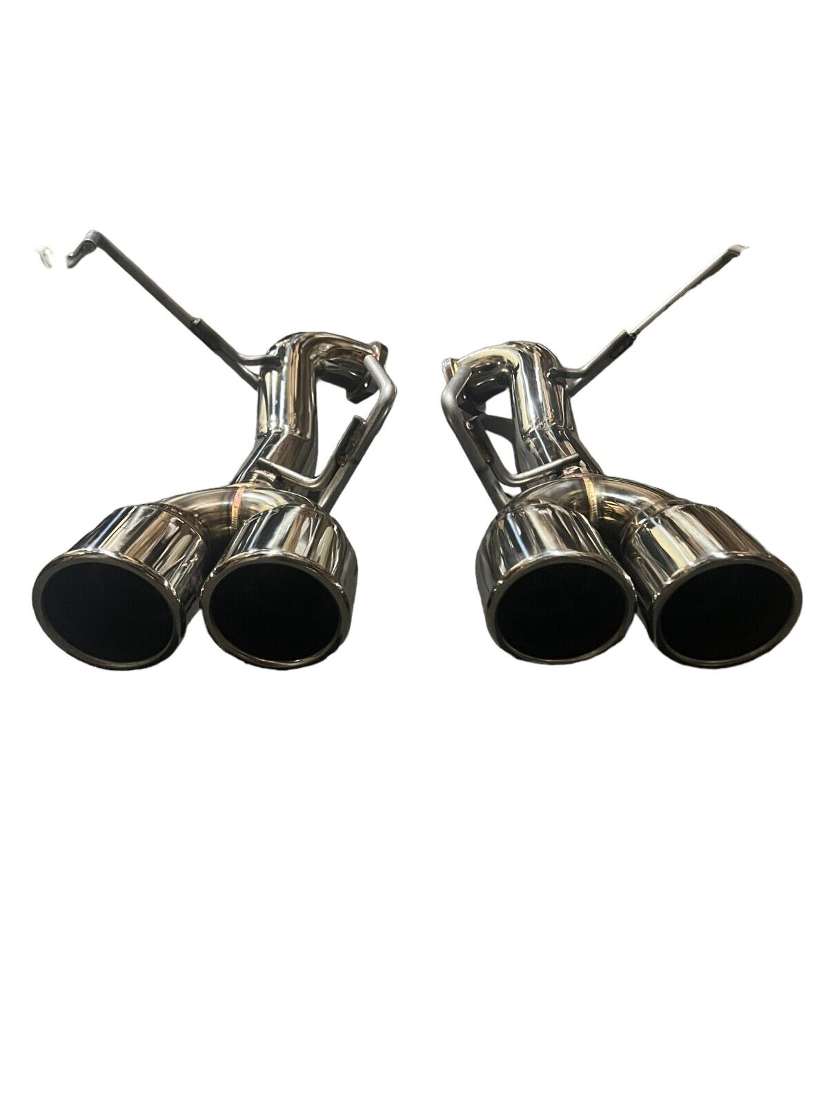 Stainless steel axle back delete exhaust muffler for Subaru WRX, by JackSpania Racing, showing the sleek metal finish and exhaust tip.