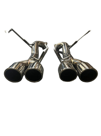 Stainless steel axle back delete exhaust muffler for Subaru WRX, by JackSpania Racing, showing the sleek metal finish and exhaust tip.