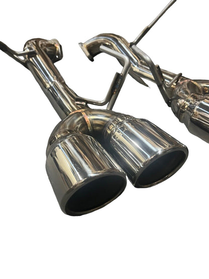 Stainless steel axle back delete exhaust muffler for Subaru WRX by JackSpania Racing, showing polished metal finish and mounting details.