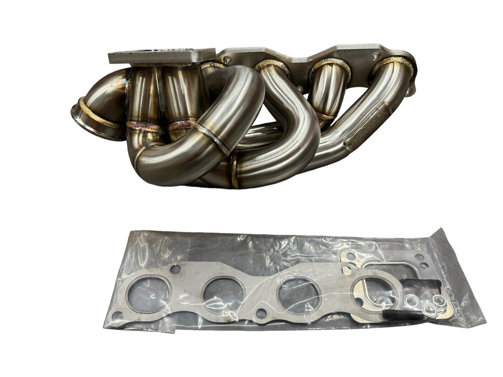 JackSpania Racing K20 K24 top mount T3 T4 60mm wastegate turbo manifold for K series K swap, suitable for AWD and FWD cars.