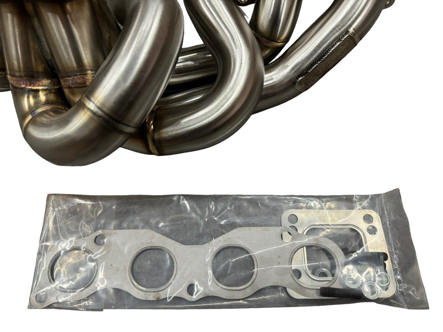 K20 K24 top mount T3 T4 60mm wastegate and turbo manifold for K series engines, made by JackSpania Racing, for AWD and FWD setups.