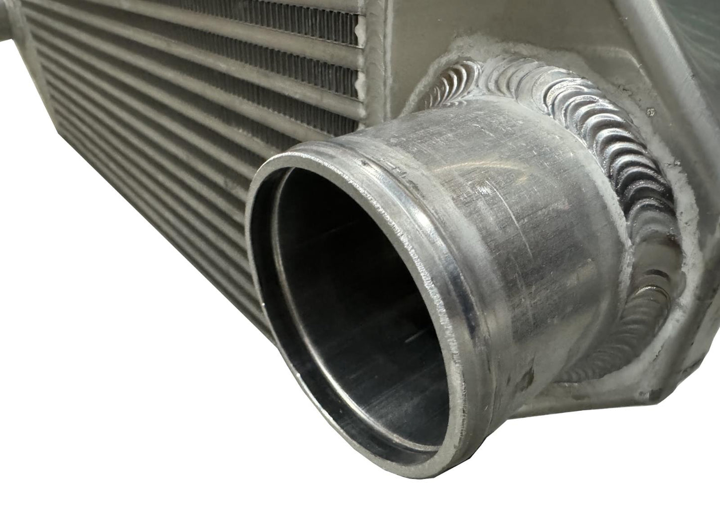JackSpania Racing backdoor front mount intercooler with dual 3-inch inlet and outlet for up to 850HP, TIG welded engine part.