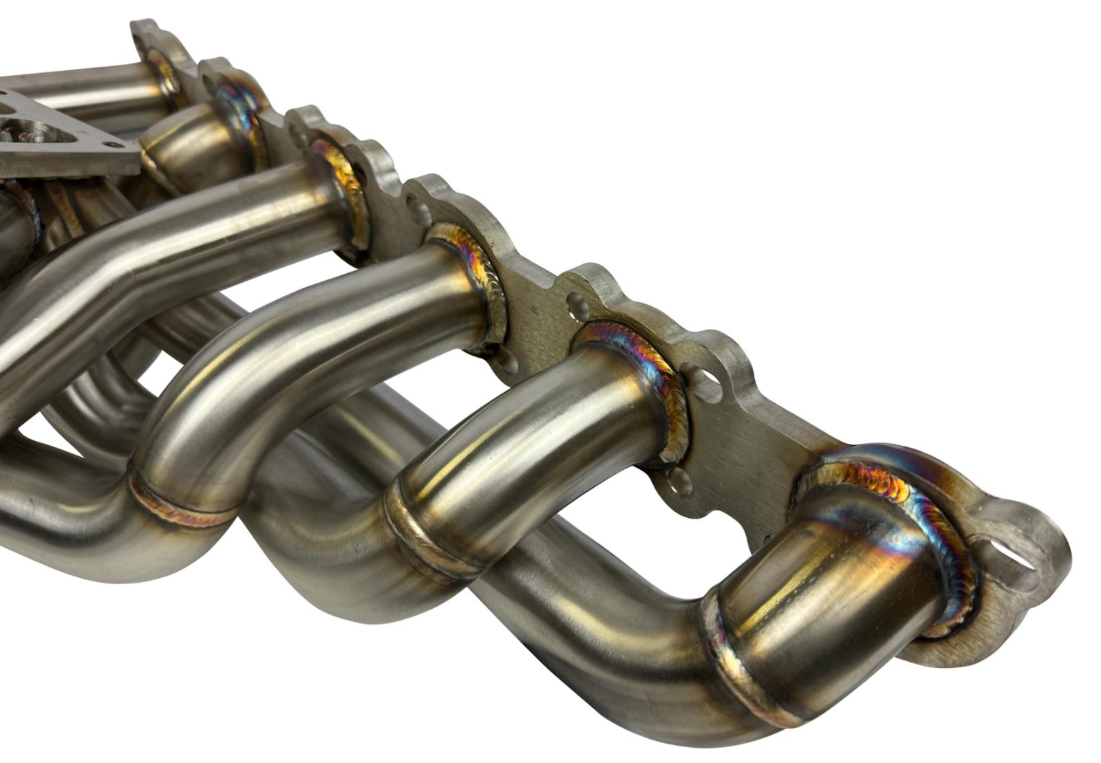 JackSpania Racing RB20 RB25 RB26 T4 top mount turbo manifold for Nissan GTR, featuring 44mm twin scroll exhaust design.