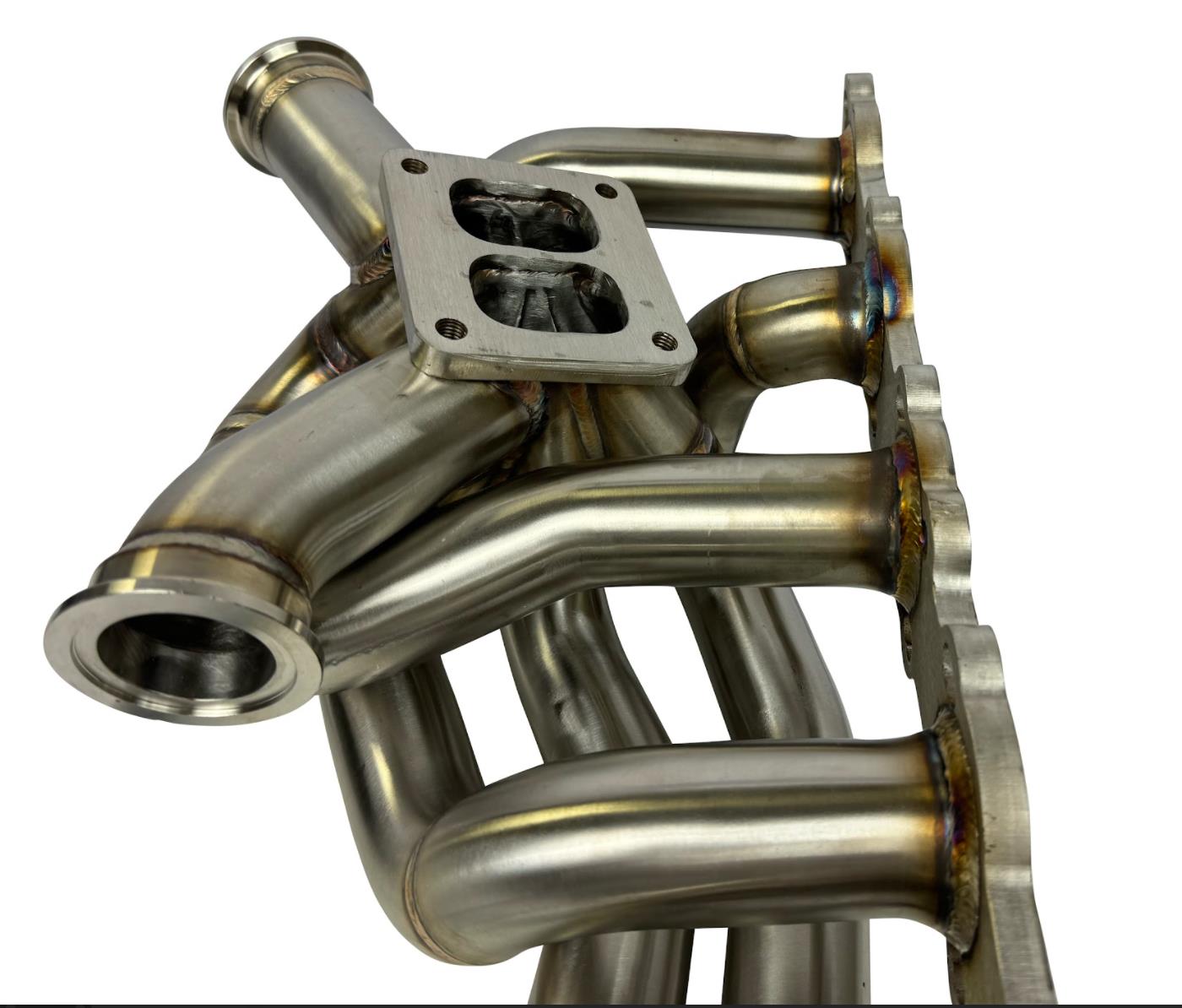 JackSpania Racing RB20 RB25 RB26 T4 top mount turbo manifold for Nissan GTR, featuring 44mm twin scroll exhaust ports.