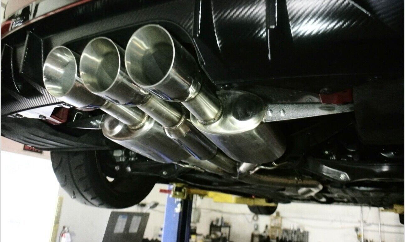 Stainless steel catback exhaust muffler for Honda Civic FK8 Type R 2017+ by JackSpania Racing, showing polished exhaust tip and piping