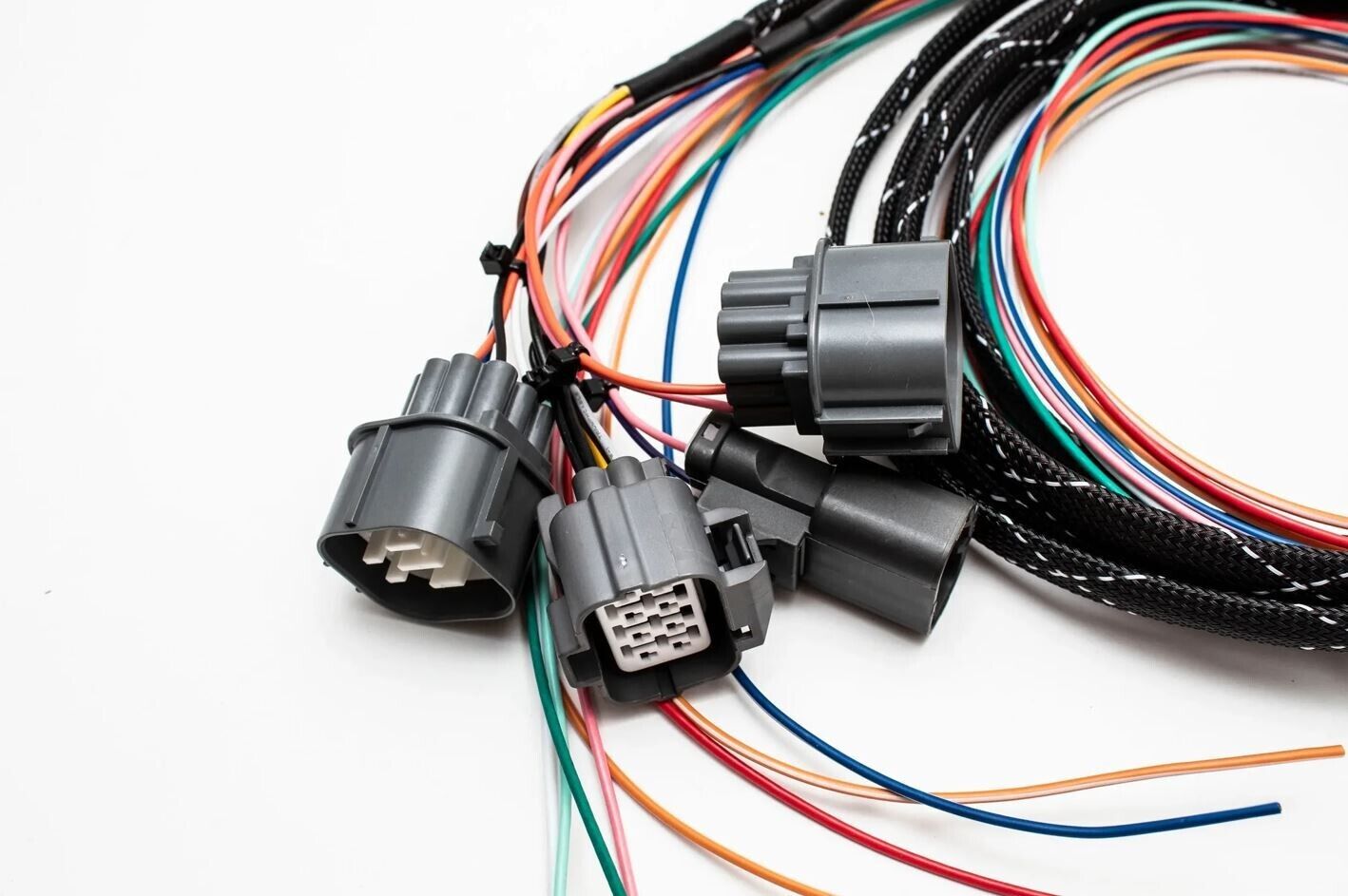 JackSpania Racing B Series OBD1 Subharness for 92-93 GSR Integra engine, shown with wiring connectors and engine components.