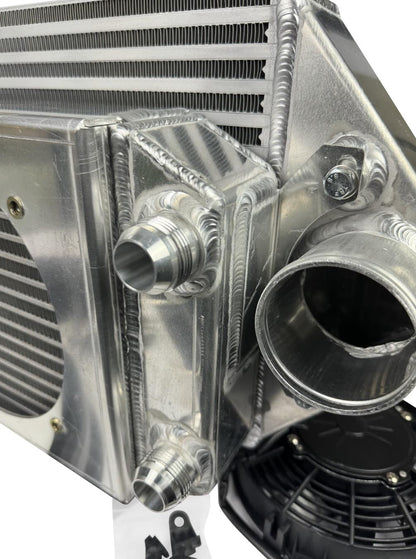 JackSpania Racing backdoor front mount intercooler with dual 3-inch pipes and full-size radiator, exterior view.