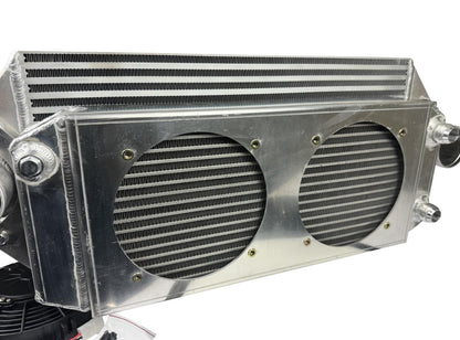 JackSpania Racing backdoor front mount intercooler with dual 3-inch pipes and full-size radiator, featuring 16AN fittings.