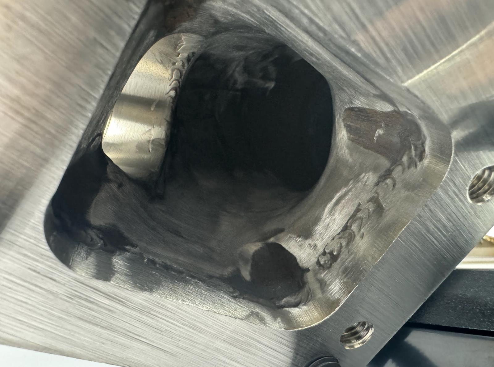BMW E46 E36 E39 tubular top mount turbo manifold with T3 T4 flange and 44mm wastegate by JackSpania Racing, made of durable 304 steel.