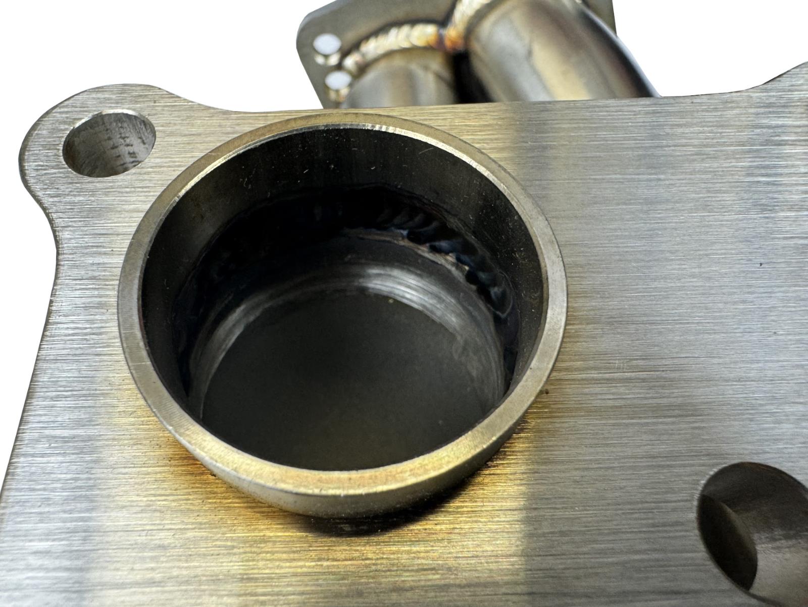 JackSpania Racing N54 top mount single front-facing turbo manifold for 135i, 335i, 535i, and Z4 with T3 T4 divided design.