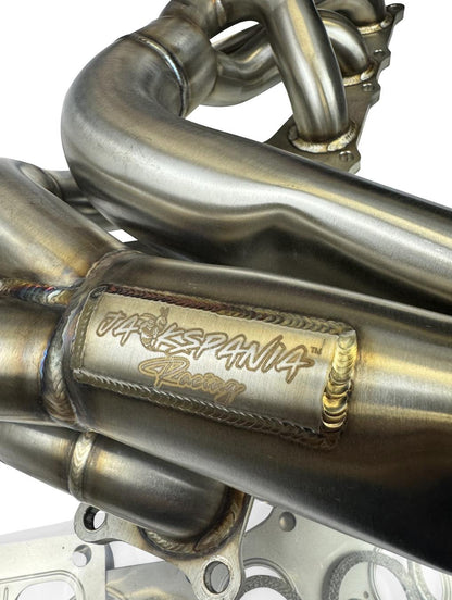 JackSpania Racing N54 top mount single front-facing turbo manifold for 135i, 335i, 535i, and Z4 with T3 T4 division.