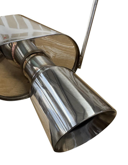 Stainless steel 2.5-inch Honda CR-V exhaust system muffler and catback by JackSpania Racing for 97-01 models, installed on vehicle.