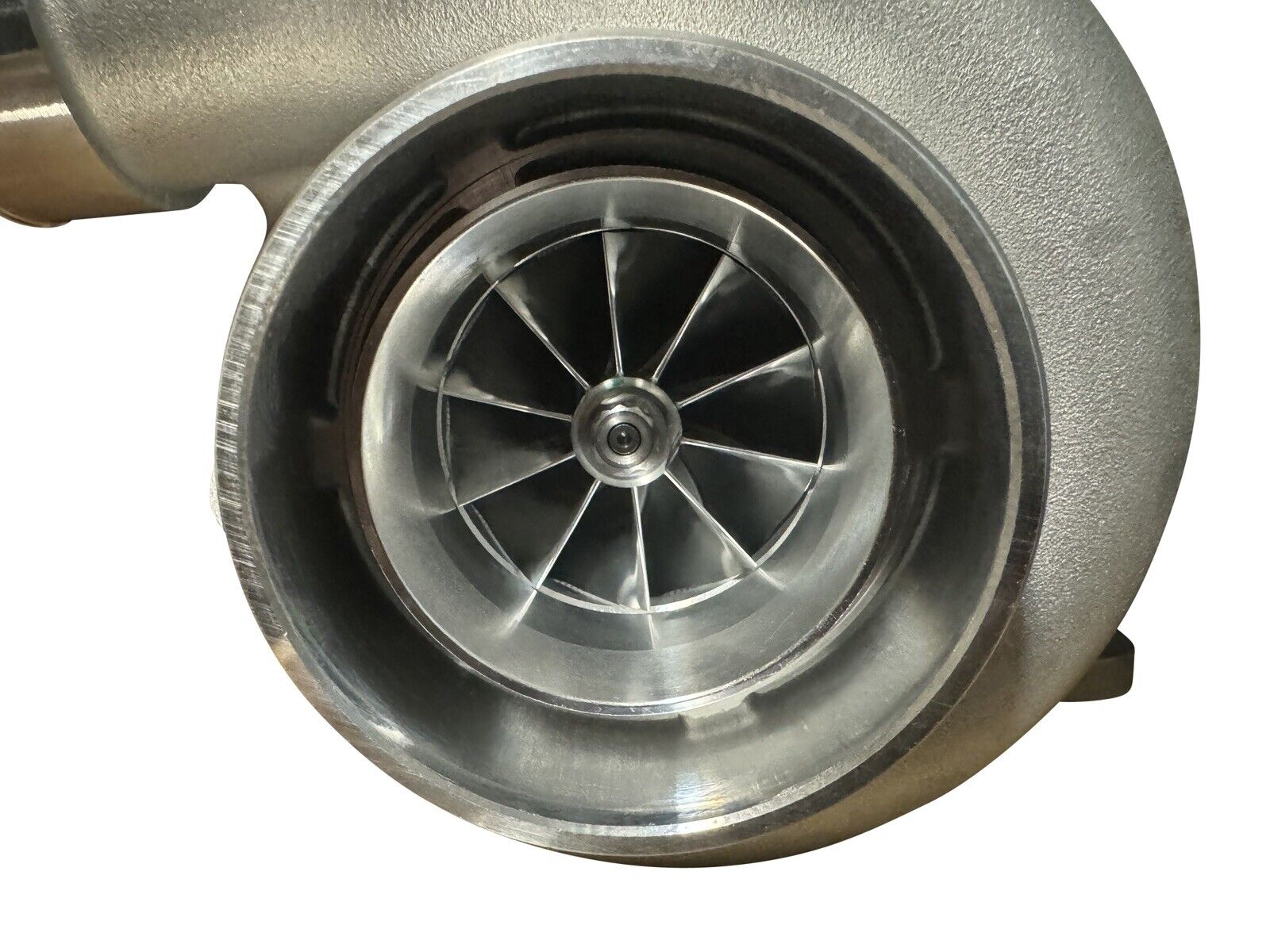 JackSpania Racing turbocharger with billet T4 flange, GTX3584RS turbine, and V-band for high-performance engine applications.