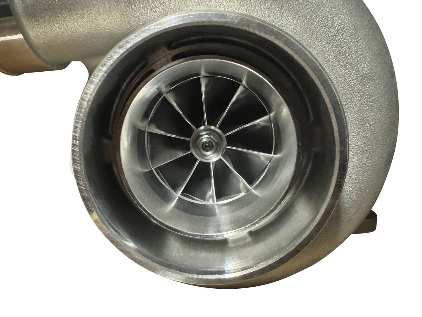 JackSpania Racing turbocharger with billet T4 flange, GTX3584RS turbine, and V-band for high-performance engine applications.