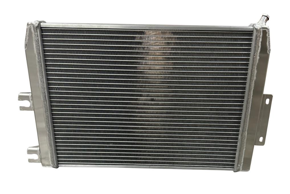 XL Performance heat exchanger for 2023+ Nissan Z VR30 engine parts by JackSpania Racing, showcasing the sleek metal design.