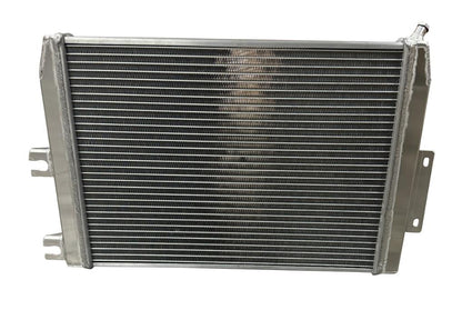 XL Performance heat exchanger for 2023+ Nissan Z VR30 engine parts by JackSpania Racing, showcasing the sleek metal design.