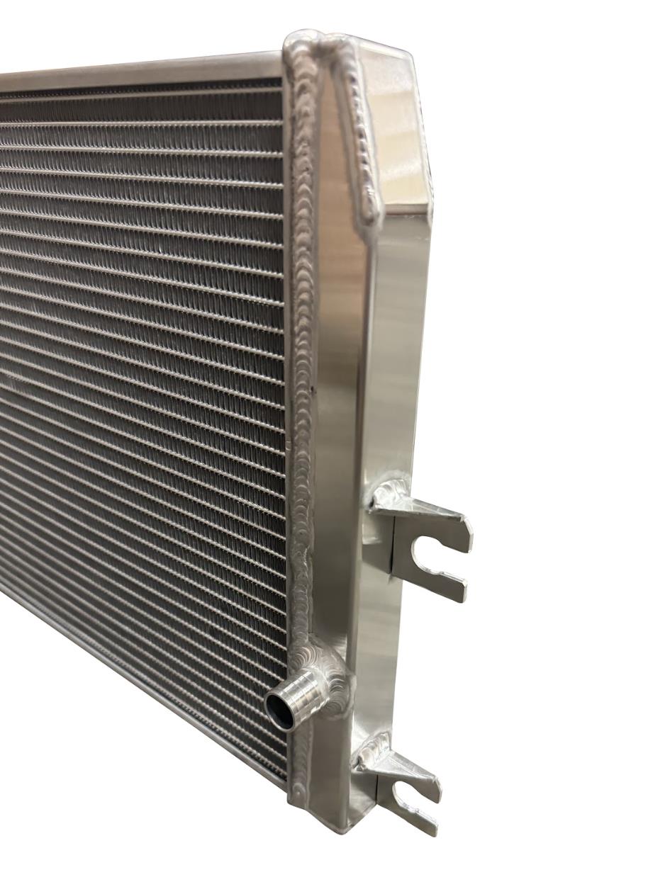 XL Performance Heat Exchanger for 2023+ Nissan Z VR30 engine parts by JackSpania Racing, showing the core and fittings.