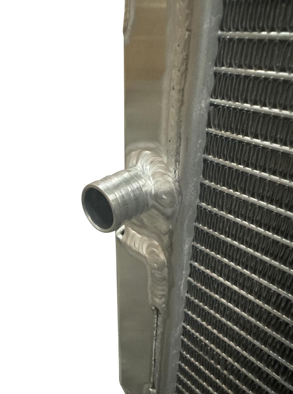 XL Performance Heat Exchanger by JackSpania Racing for 2023+ Nissan Z VR30 engine, shown installed in the engine bay.