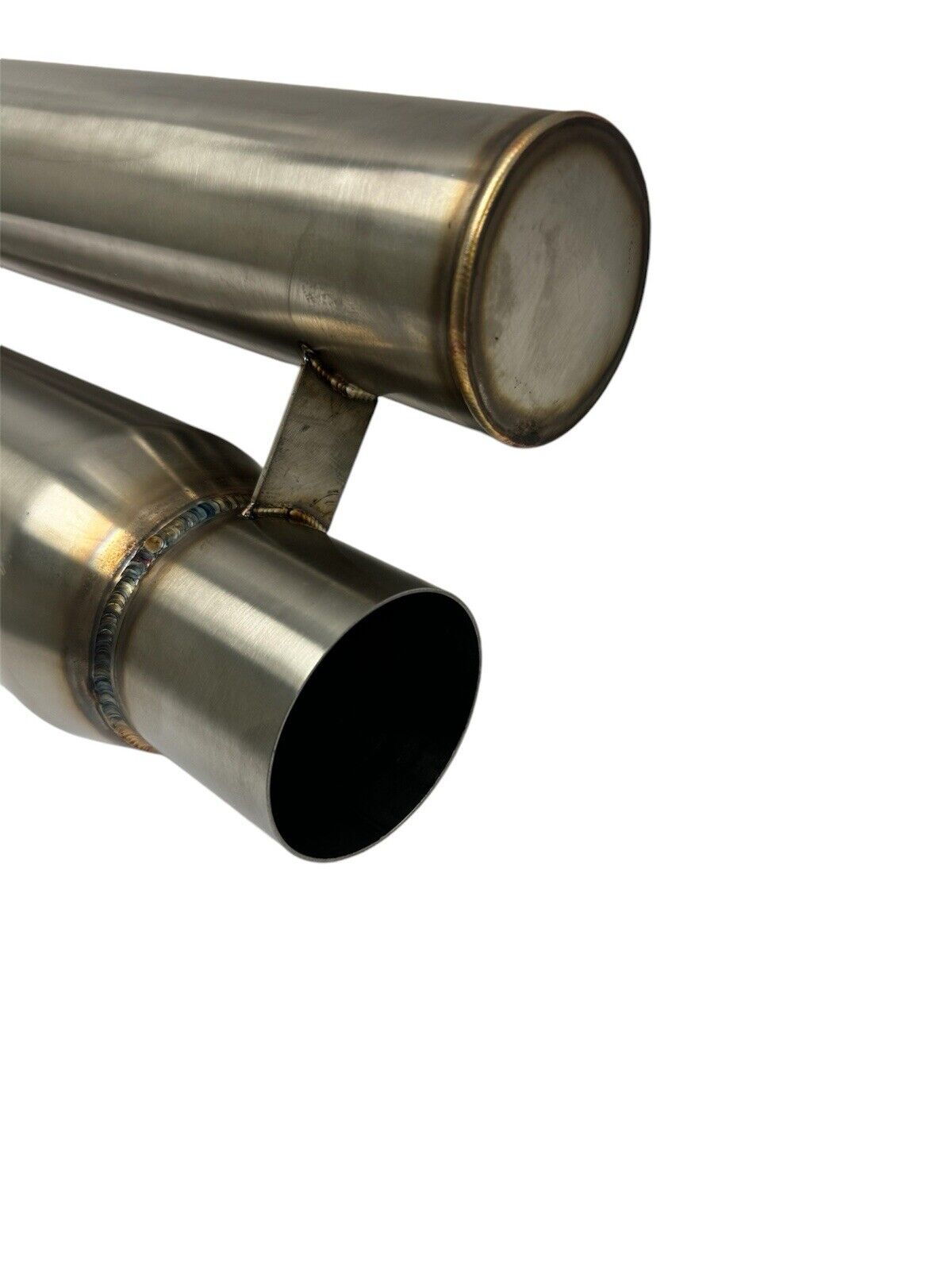 JackSpania Racing 2.5" and 3" Helmholtz style resonator muffler with wave cut design for ultra-quiet exhaust pipes in stainless steel.