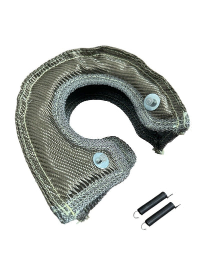 JackSpania Racing T4 Titanium Fiber Turbo Blanket heat shield covering a turbocharger for engine protection and heat management.