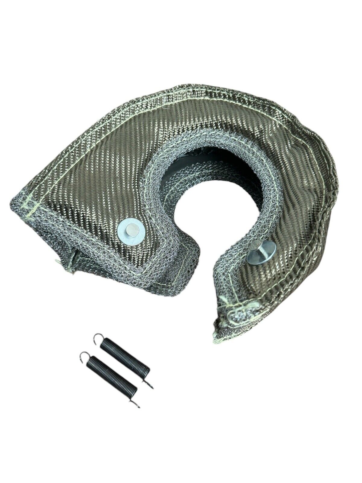 JackSpania Racing T4 Titanium Fiber Turbo Blanket heat shield barrier wrapping around a turbocharger for engine protection.
