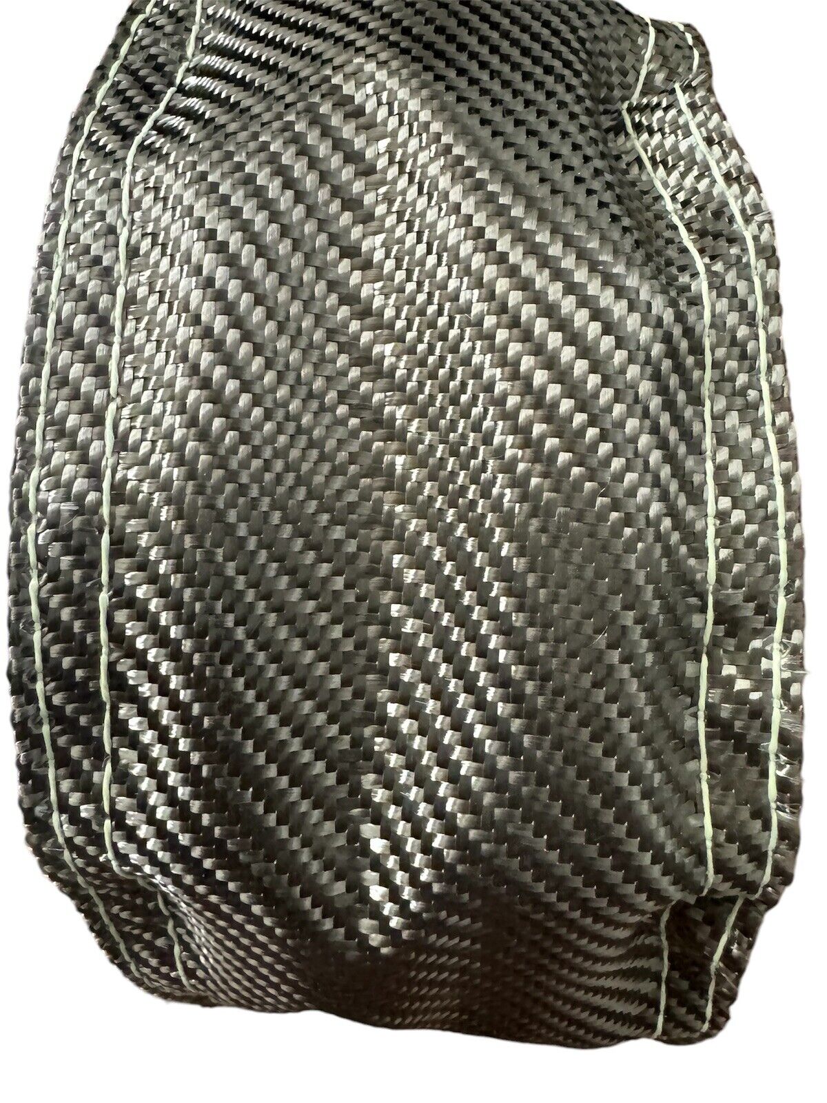 JackSpania Racing T4 Titanium Fiber Turbo Blanket heat shield barrier wrapped around a turbocharger for engine protection and heat management.