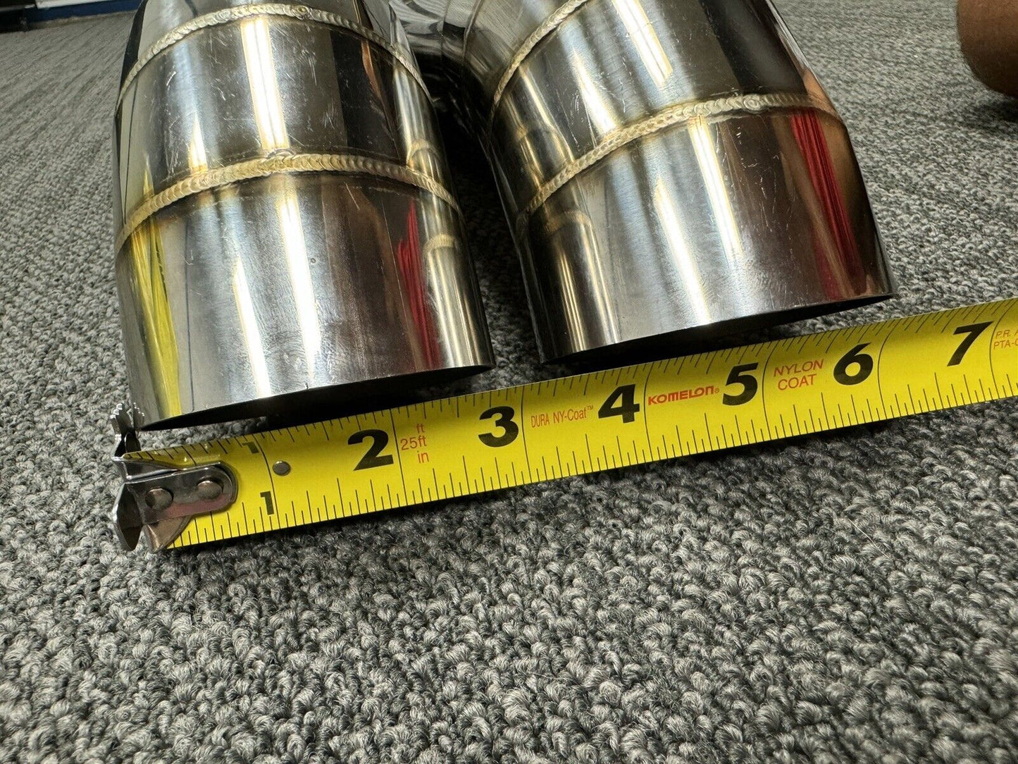 Dual tip stainless steel blast pipe with 3-inch turn down pie cut design from JackSpania Racing, suitable for exhaust systems.