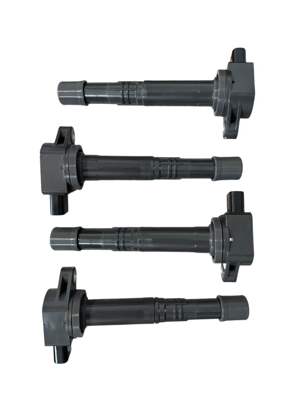 Set of four JackSpania Racing K-Series coil packs for Honda K20 and K24 engines, automotive engine parts.