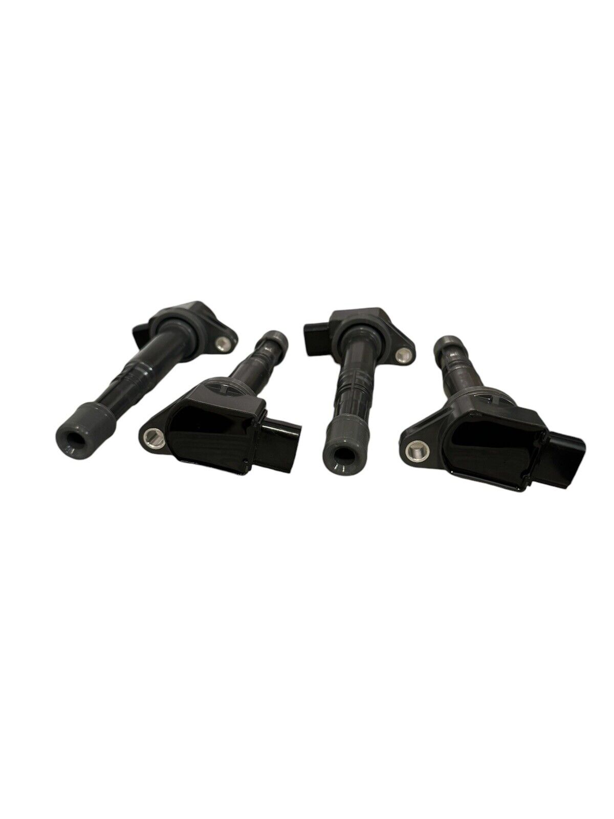 Set of four JackSpania Racing K-Series coil packs for Honda K20 and K24 engines, engine parts for improved performance.