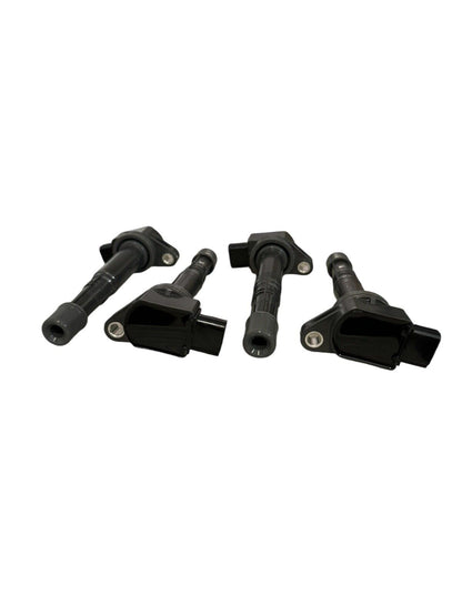 Set of four JackSpania Racing K-Series coil packs for Honda K20 and K24 engines, engine parts for improved performance.