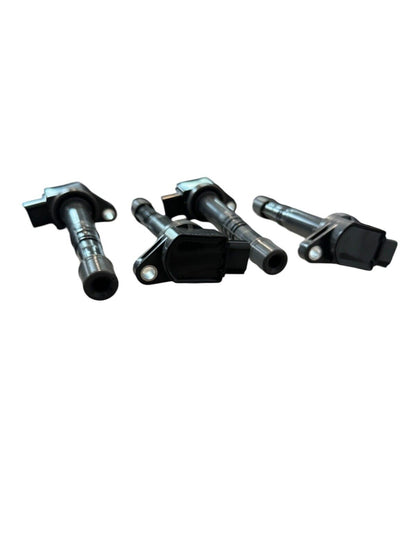 Set of four JackSpania Racing K-Series coil packs for Honda K20 and K24 engines, engine parts for performance upgrades.