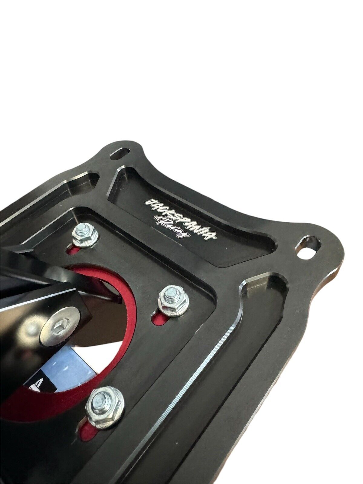 JackSpania Racing billet short shifter with lockout for Nissan 370Z Z34 transmission, featuring a sleek, durable design and fitment details.