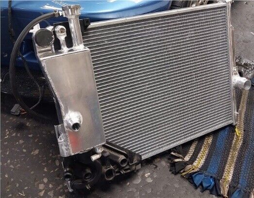 Aluminum coolant reservoir tank for BMW E46 E53 E83 323i 325i 328i 330i M52 M54 engine, by JackSpania Racing.