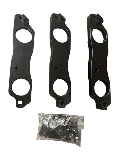 Black aluminum coil pack brackets for R35 GTR, compatible with Toyota 1JZ and 2JZ engines, by JackSpania Racing.