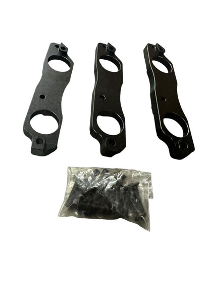Black aluminum coil pack brackets for R35 GTR, compatible with Toyota 1JZ and 2JZ engines, by JackSpania Racing.