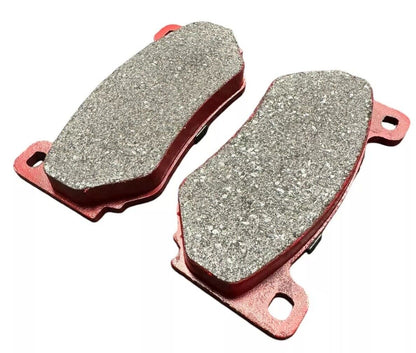 Interior view of four JackSpania Racing JSR Super Street upgraded ceramic brake pads for high-performance braking.