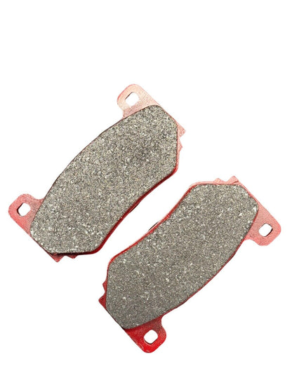 Set of four JackSpania Racing Super Street upgraded ceramic brake pads for interior use, designed for high-performance braking.