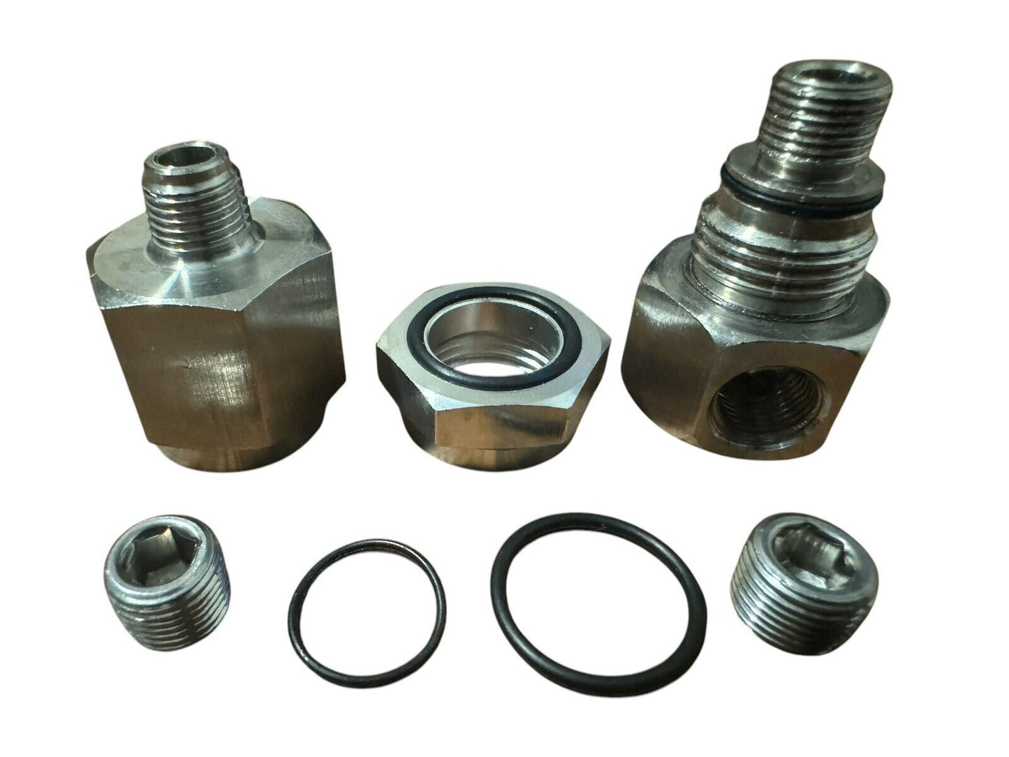 JackSpania Racing K Series Oil Pressure Sensor Adapter with 1/8NPT ports for Honda K20 K24 engines.