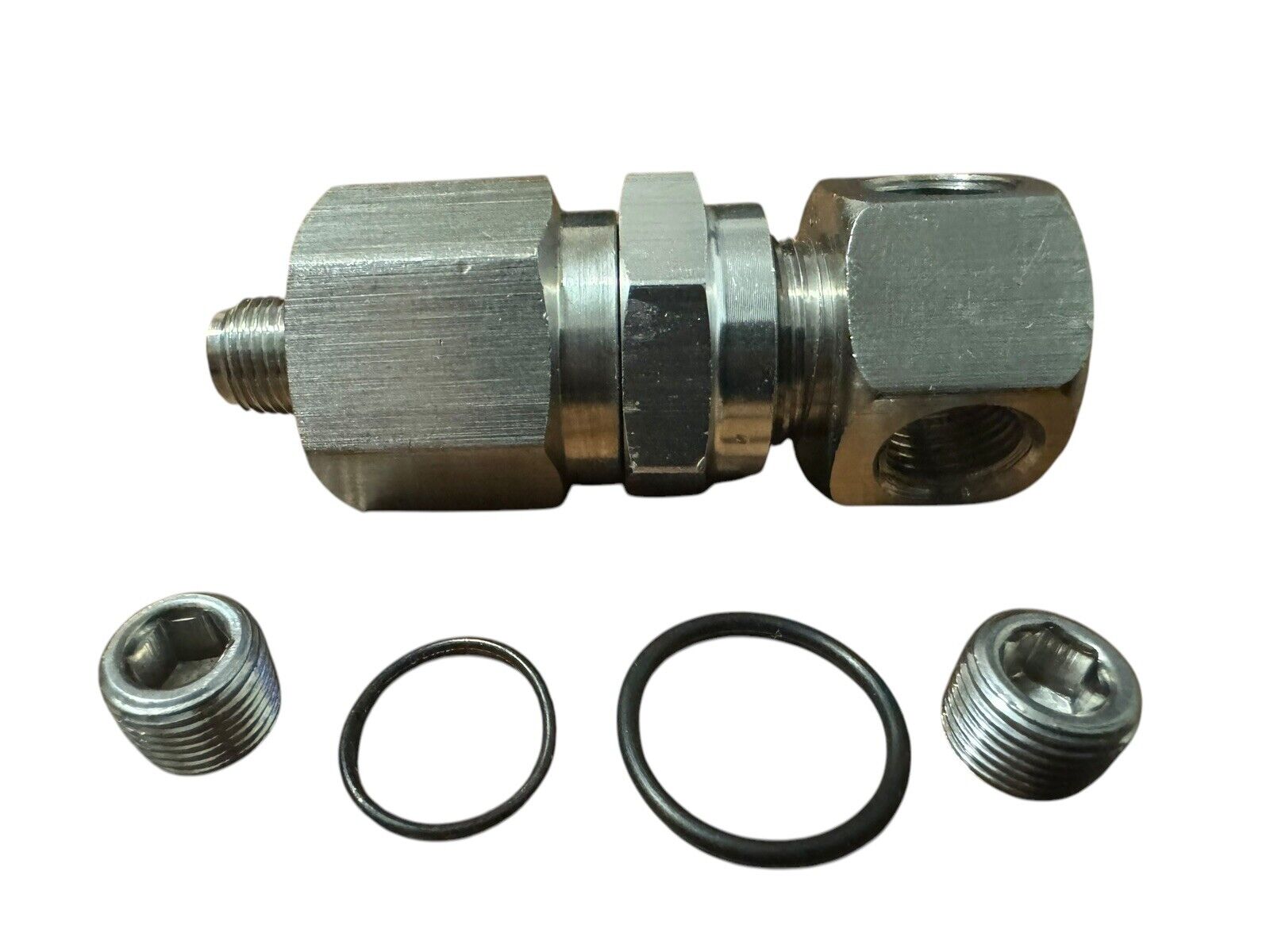 JackSpania Racing K Series Oil Pressure Sensor Adapter with 1/8NPT threads for Honda K20 and K24 engine parts.