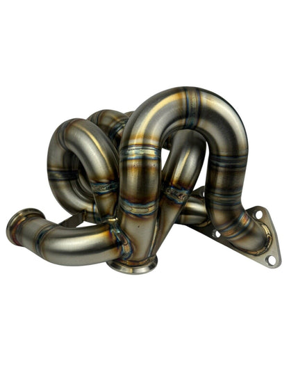 316SS tubular turbo manifold for Evo 7-9 with 44mm V-band wastegate, compatible with Garrett G25 G30, by JackSpania Racing.