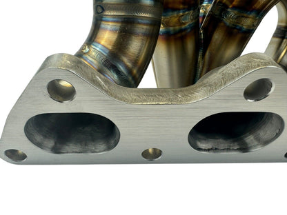 316SS tubular turbo manifold for Evo 7-9 with 44mm wastegate, V-band, compatible with Garrett G25 G30, by JackSpania Racing.