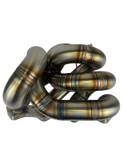 316SS tubular turbo manifold for Evo 7-9 with 44mm wastegate, V-band, compatible with Garrett G25 G30, by JackSpania Racing.