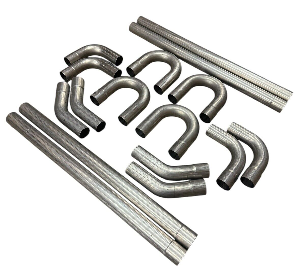 JackSpania Racing stainless steel exhaust manifold tubing, 3-inch mandrel bent piping, 18 gauge, straight and bent sections for exhaust systems.