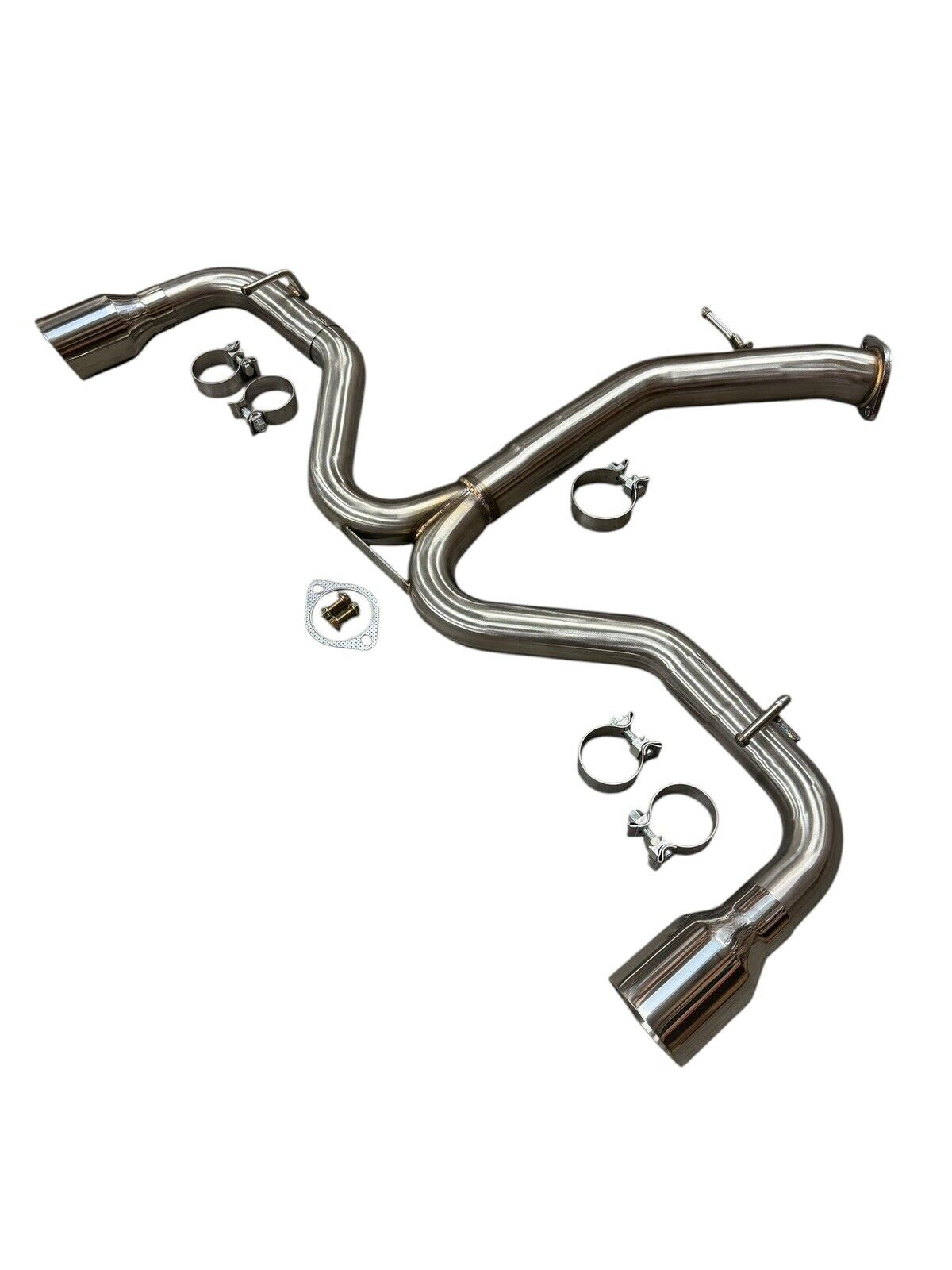 Stainless steel axle back exhaust for Hyundai Elantra GT 2018-2020 and i30 2017-2021 by JackSpania Racing, showing the polished exhaust tip.