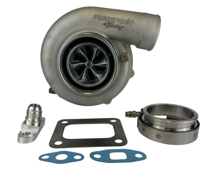 JackSpania Racing billet wheel turbo with V-band turbine housing, T3/T4 .81/.96 A/R, suitable for high-performance engine applications.